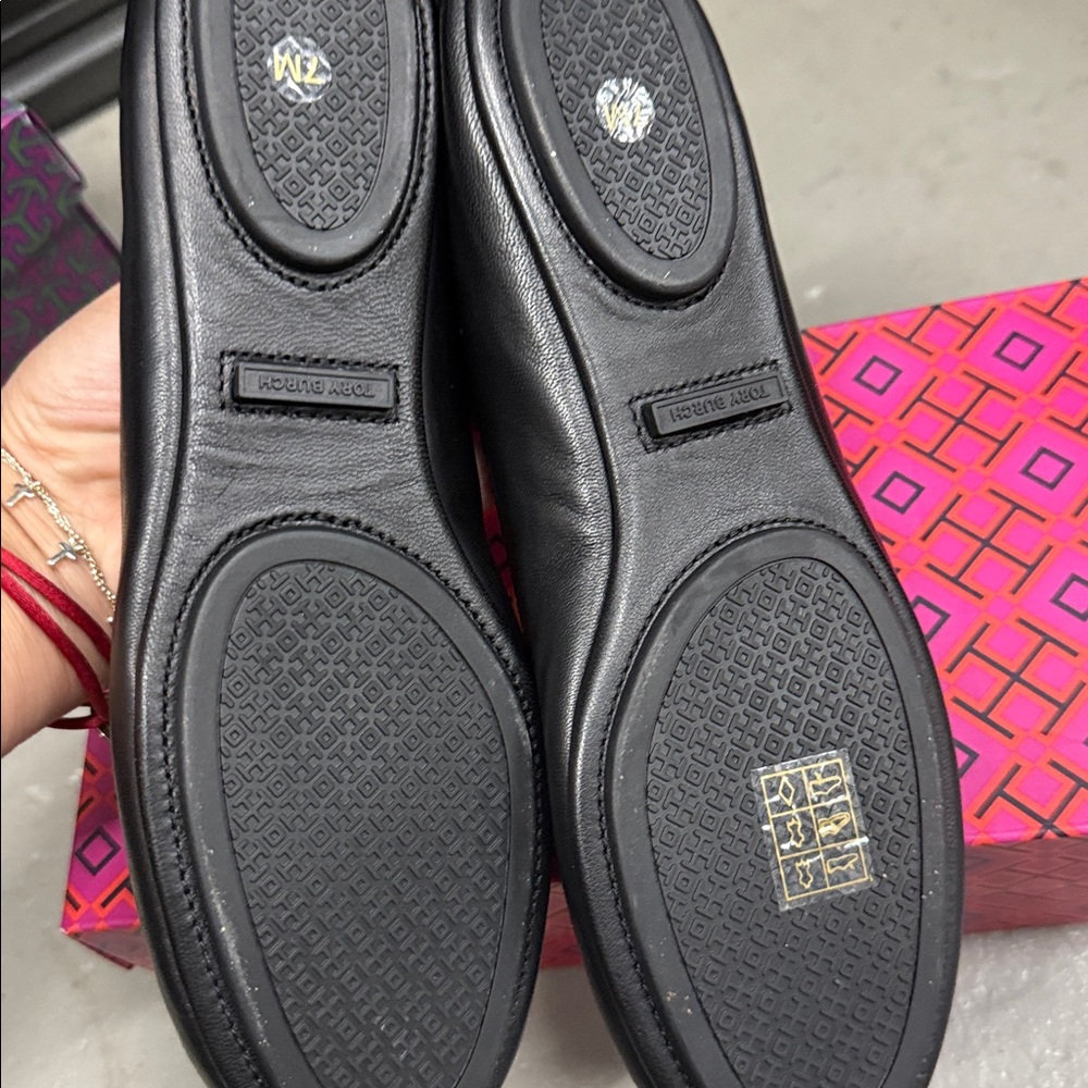 Tory Burch Black Flats with Gold Emblem - Picture 4 of 8